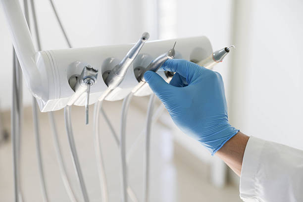 Professional Tooth Extraction technician working in Crosby, TX